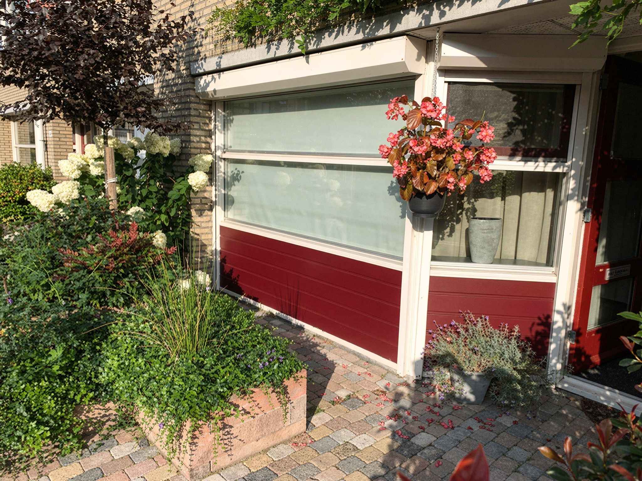 Keralit sponningdeel 143 wijnrood gevelbekleding bij woning