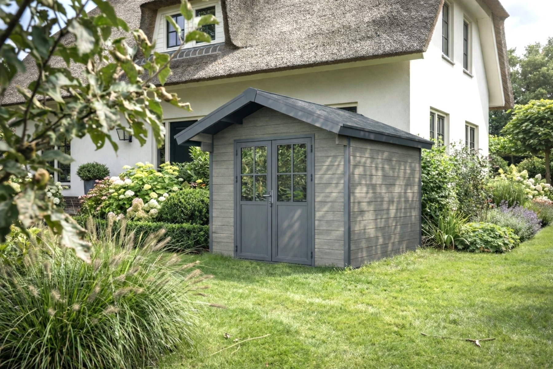 Granieten kunststof schuurtje in tuin