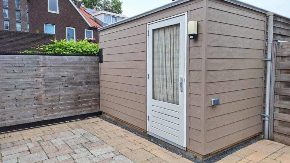 Eurotexx potdeksel 180 mm in olijf op tuinhuis